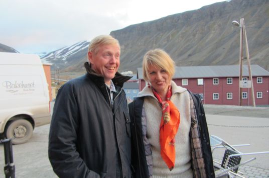 Man and woman on airfield