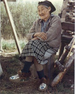 Old native Alaskan woman sitting on chair