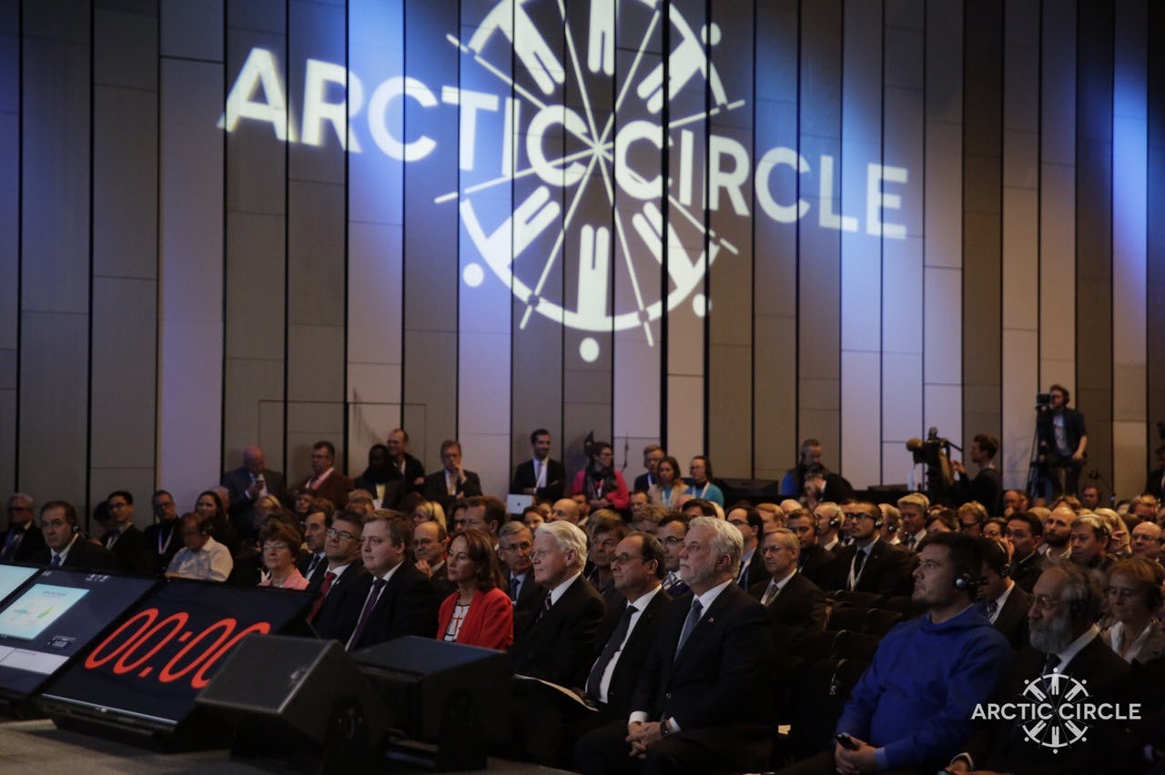 People listening to speech at conference