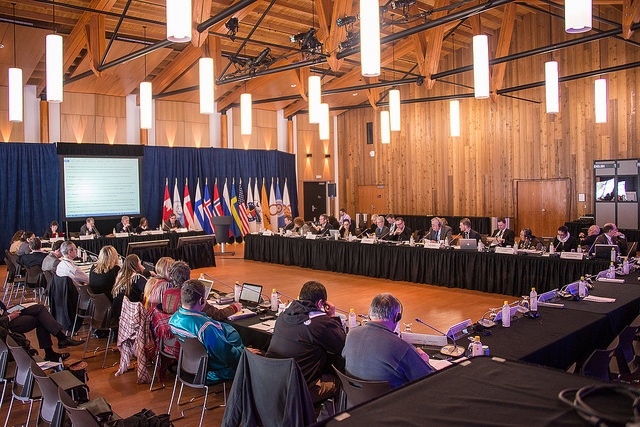 Senior Arctic Officials sitting at table in Whitehorse October 2013