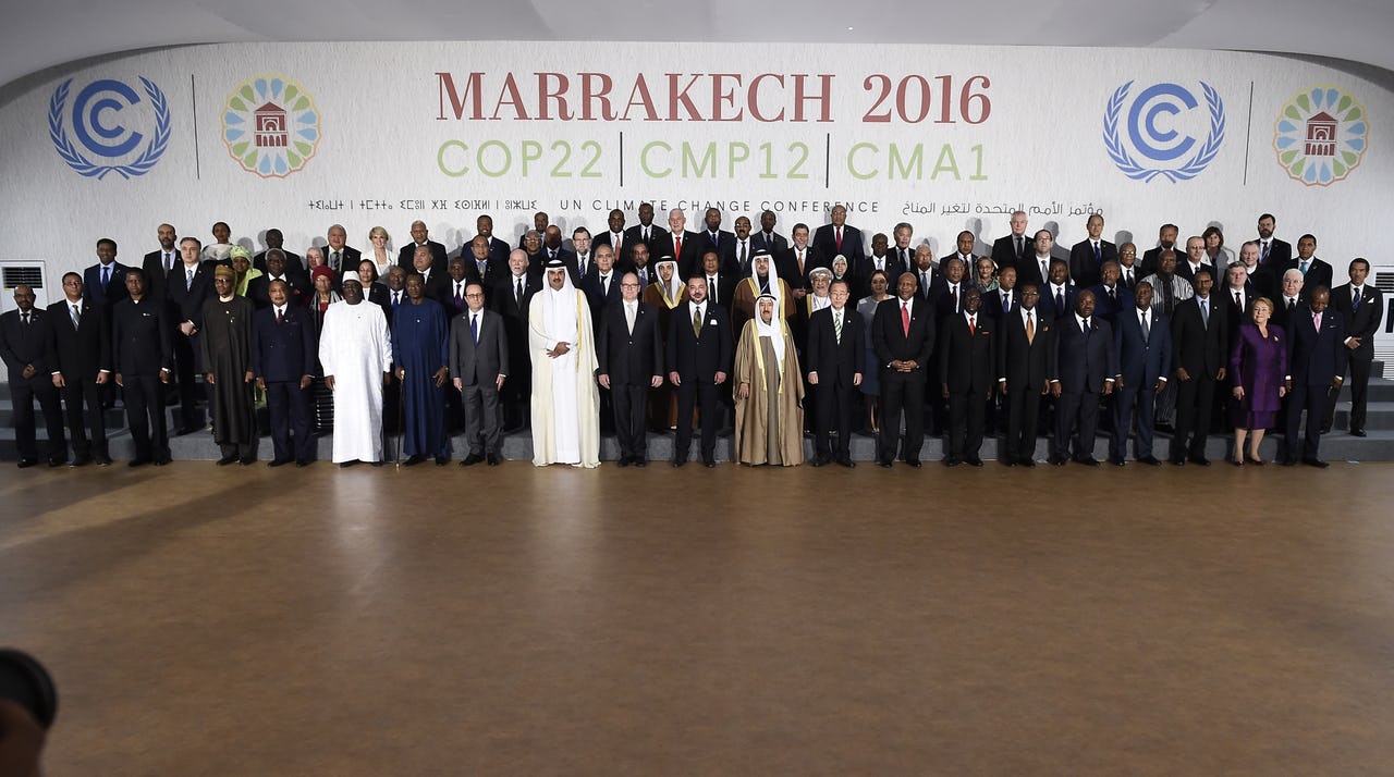 Head of States standing on podium in front of COP22 logo in Marrakesh, Morocco in November 2016.