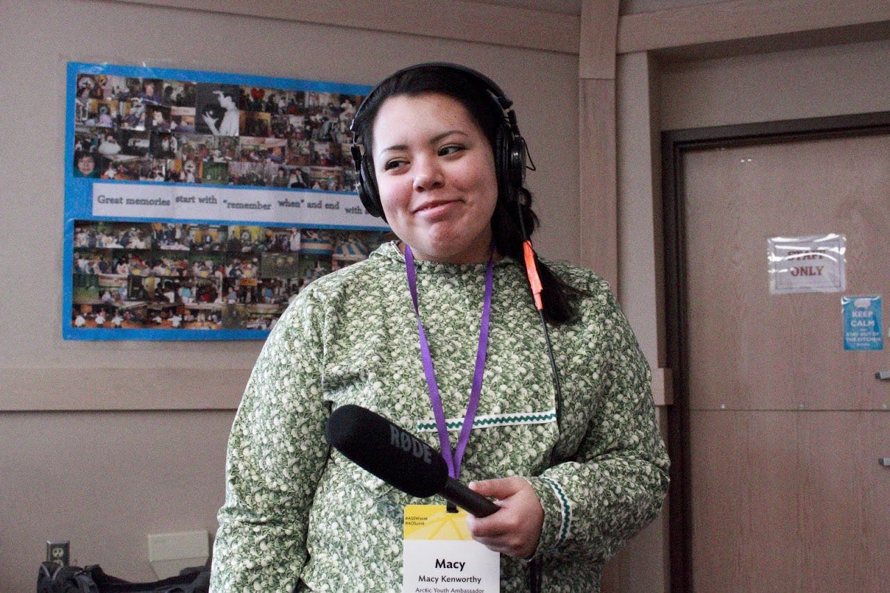 Female youth ambassador conducting interviews