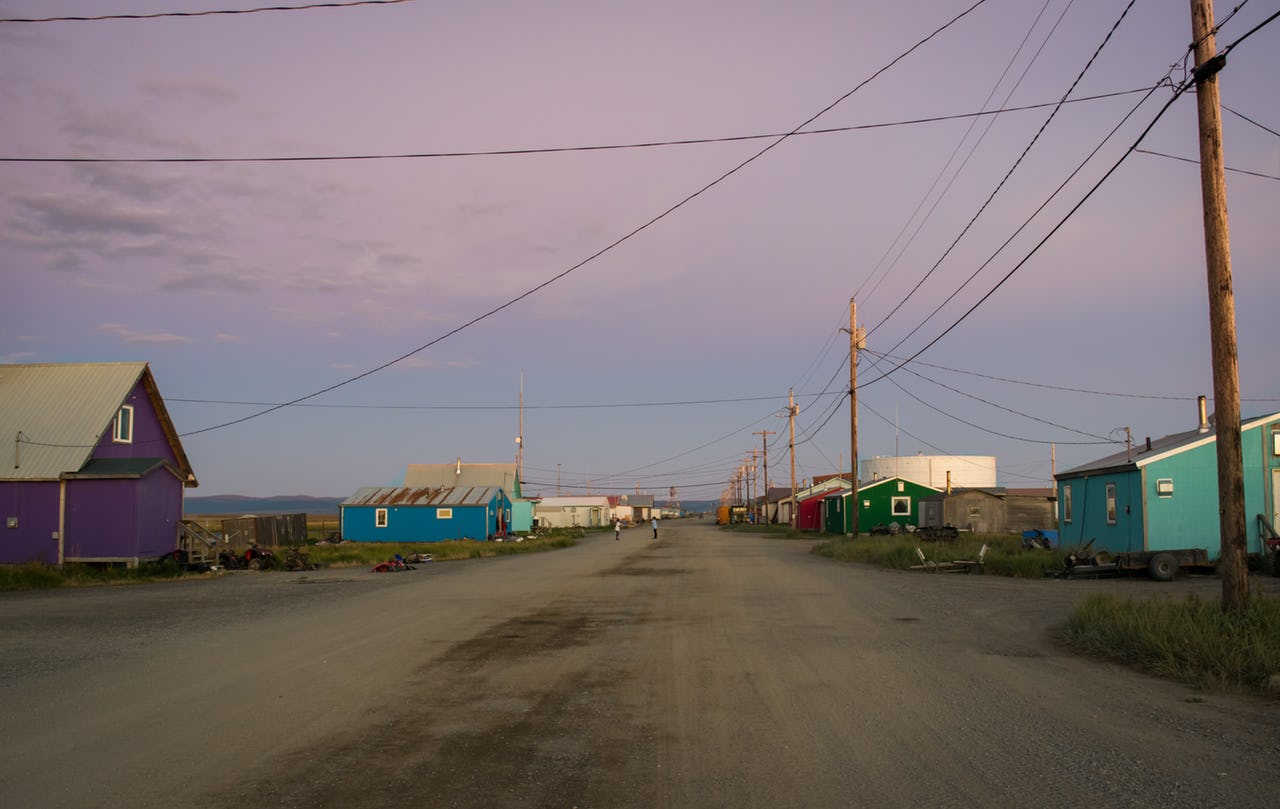 The town of Shaktoolik and its main street at sunset