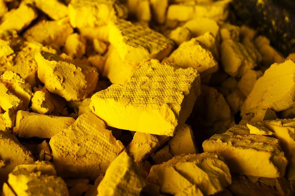 yellow pieces of stone-like material