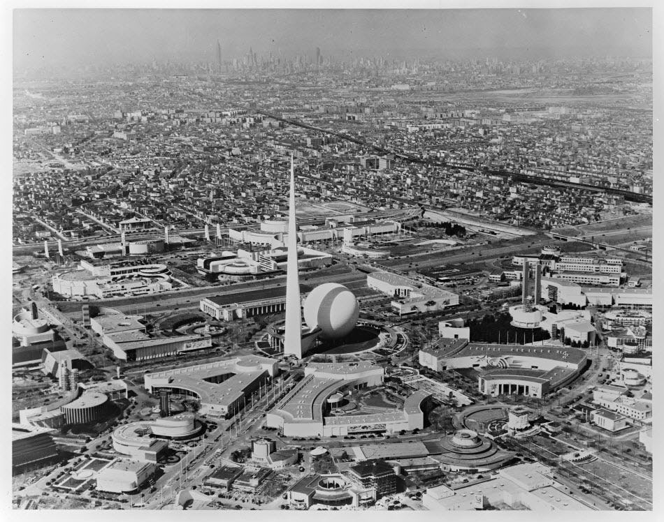 Black and white photo of a city skyline with a pointy building in the centre