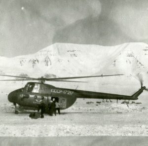 A black and white photo of a helicopter with CCCP written on the side in white