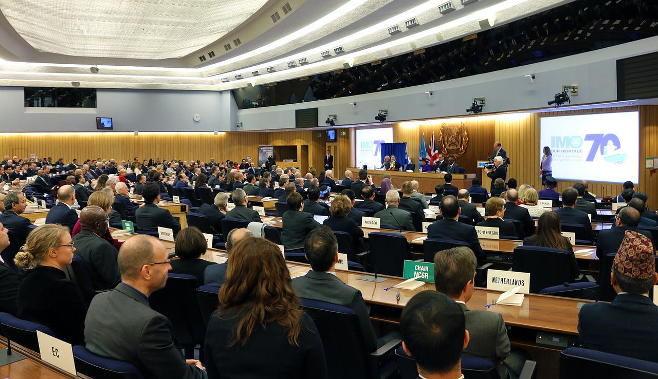 A group of people gathered in an assembly hall