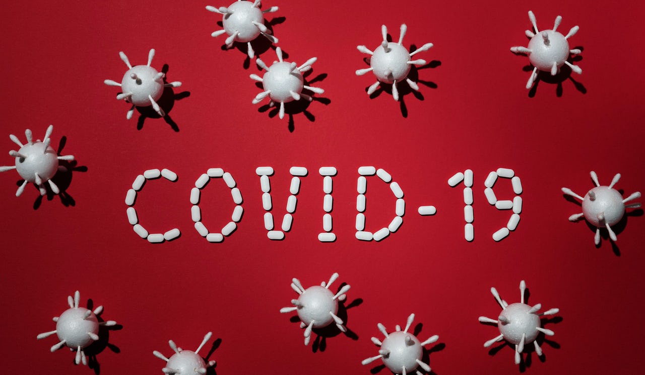 Concept of Covid-19 in red background