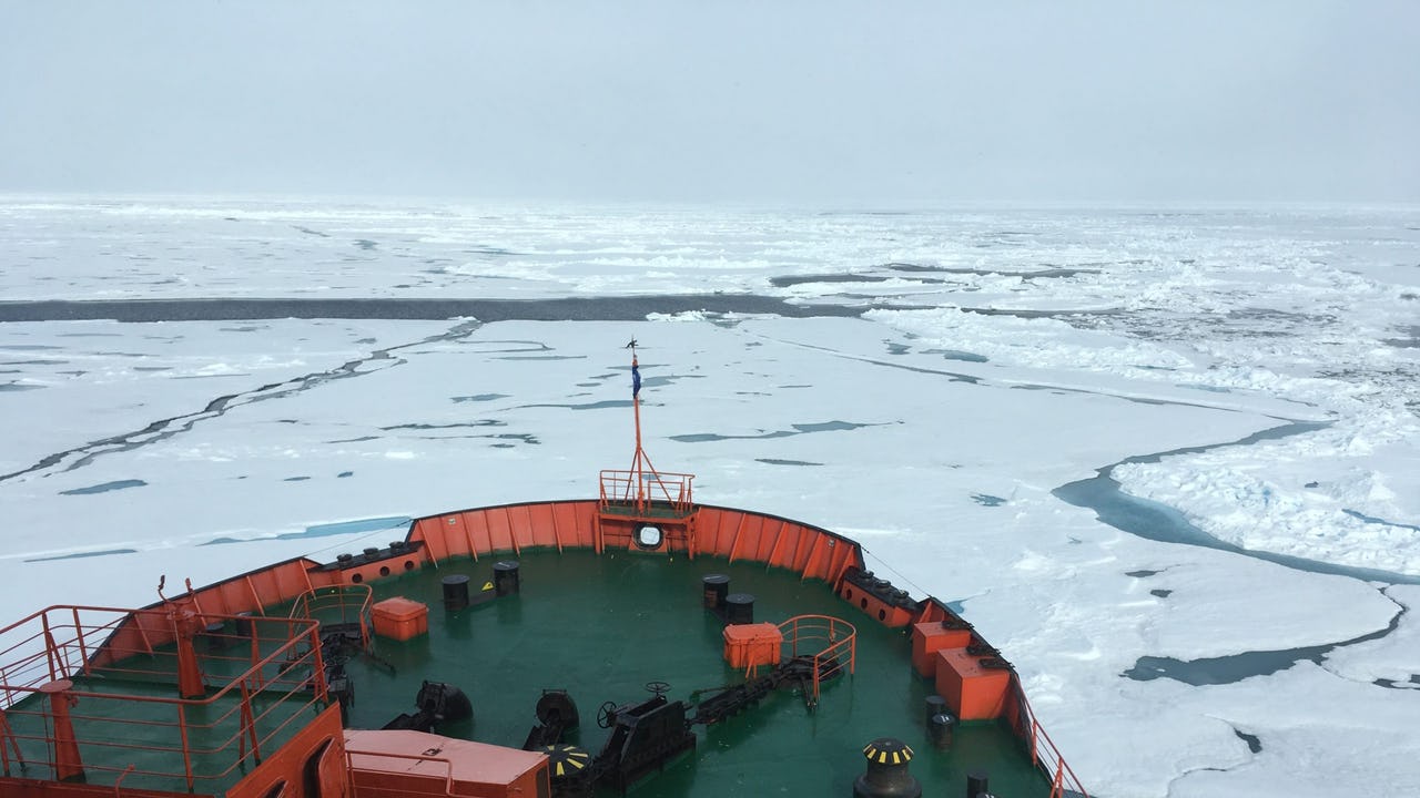 An icebreaker breaking through Arctic sea ice