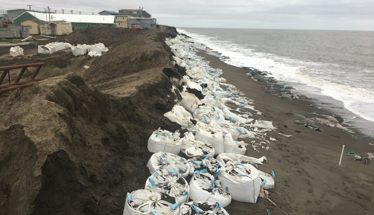Degrading supersacks in white as a coastal erosion control in in Utqiaġvik, Alaska