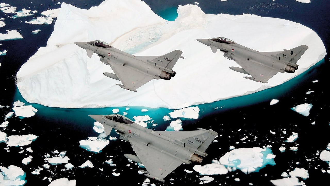 Military jets fly over sea ice