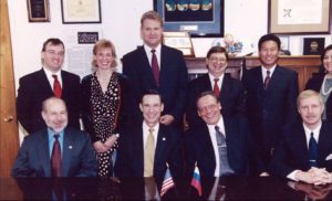 Ten Russian and American scientists from the National Oceanographic and Atmospheric Administration and Russian Academy of Sciences pose for a photo after signing a 2003 Memorandum of Understanding between Russia and the United States for World Ocean and Polar Region Studies