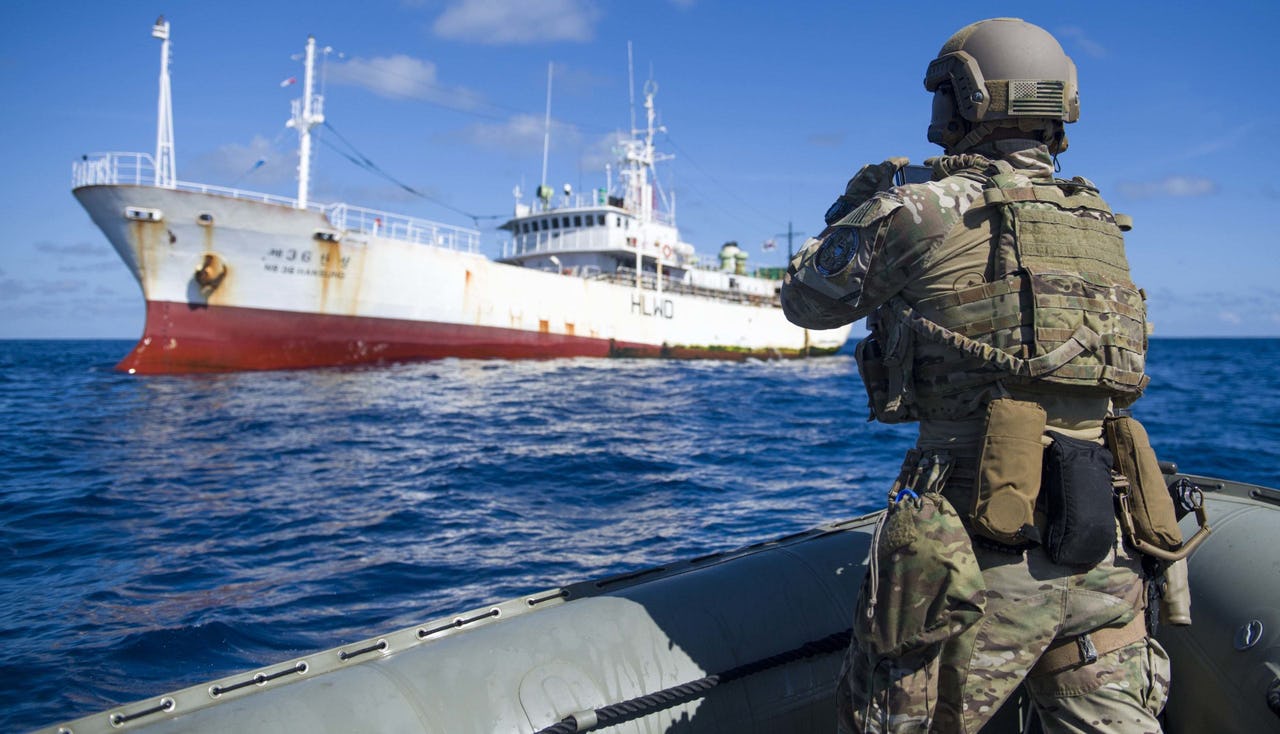 The view of a fishing vessel from a U.S. military ship
