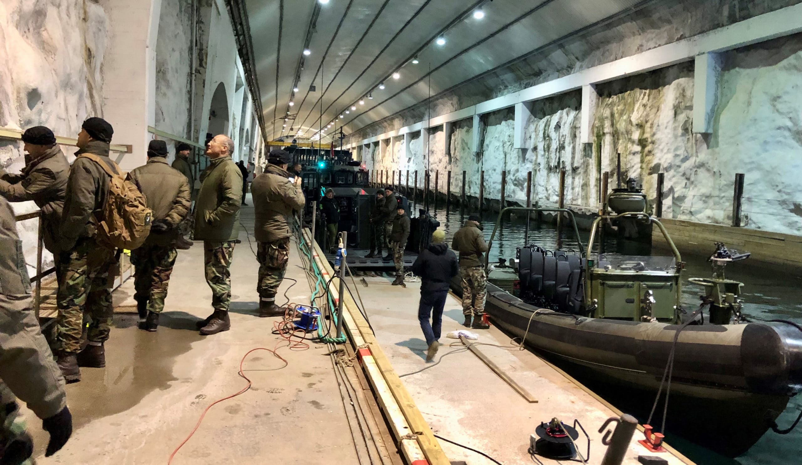 Men in military uniform in the Norwegian underground naval base Olavsvern