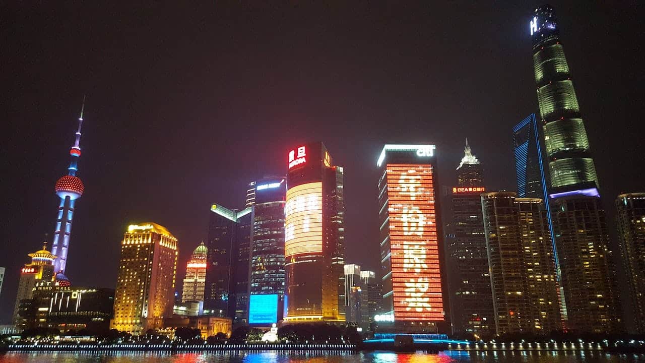 Night skyline of Shanghai with several illuminated skyscrapers