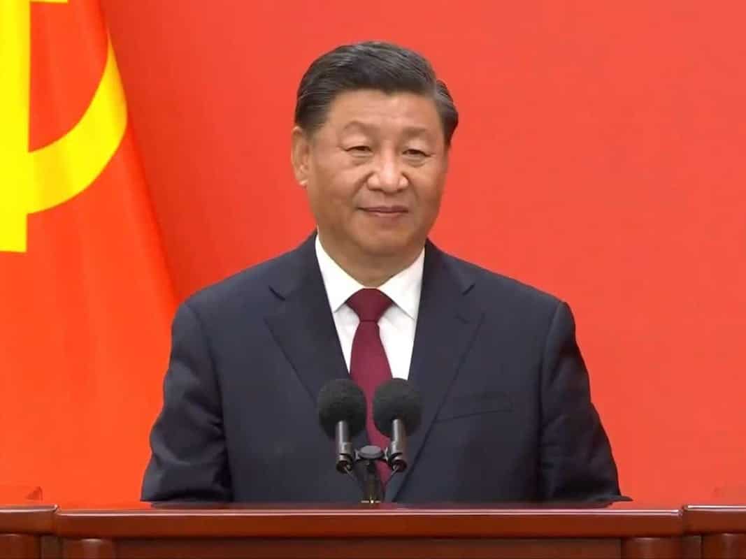 Xi Jinping standing in front of a red background at the 20th Chinese Communist Party Congress in October 2022.