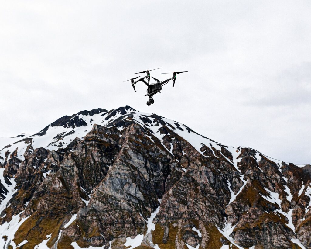 A drone flying high in the Svalbard landscape